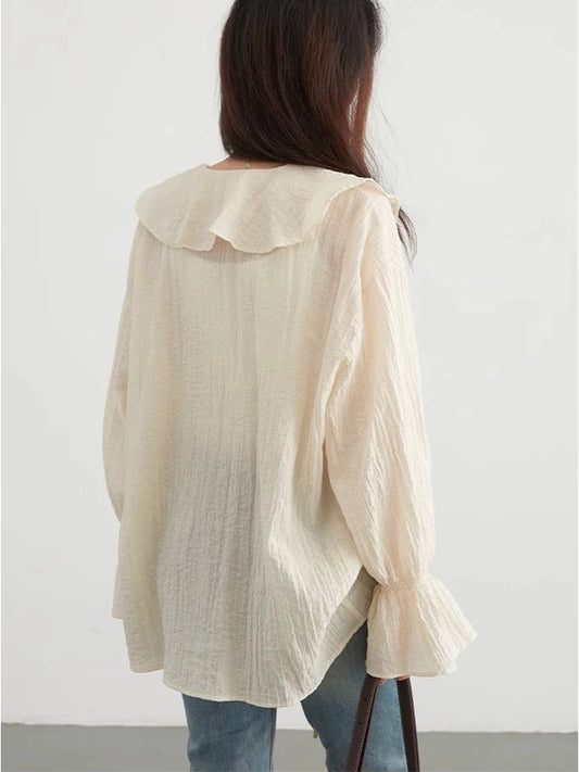 Ruffled V-Neck Lace-Up Blouse – Spring 2025 Collection