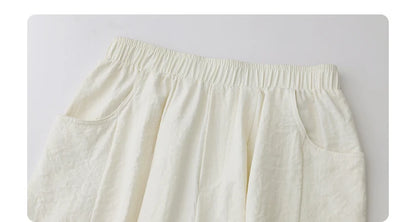High-Waist White Pleated Pants – 2025 Collection