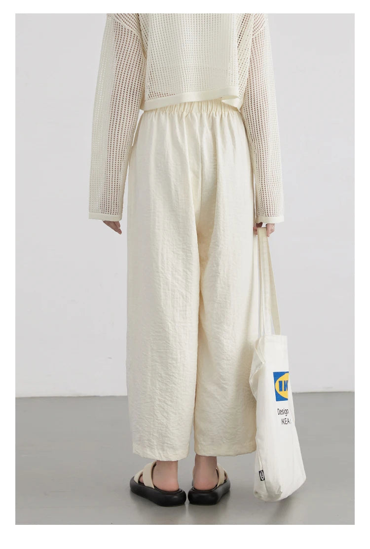 High-Waist White Pleated Pants – 2025 Collection