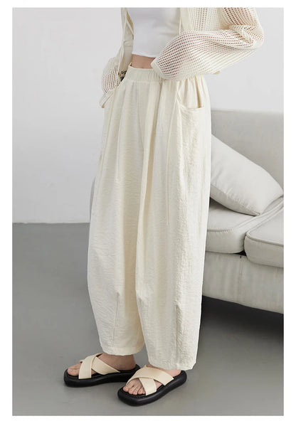 High-Waist White Pleated Pants – 2025 Collection