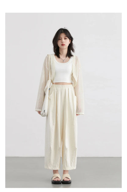 High-Waist White Pleated Pants – 2025 Collection