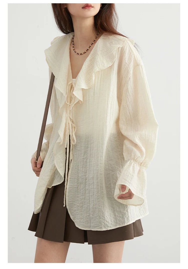 Ruffled V-Neck Lace-Up Blouse – Spring 2025 Collection