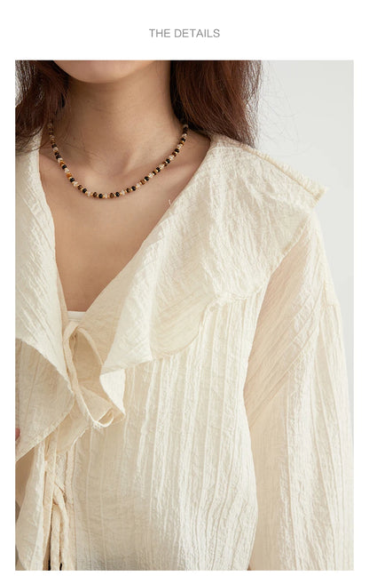 Ruffled V-Neck Lace Up Blouse – Spring/Summer 2025