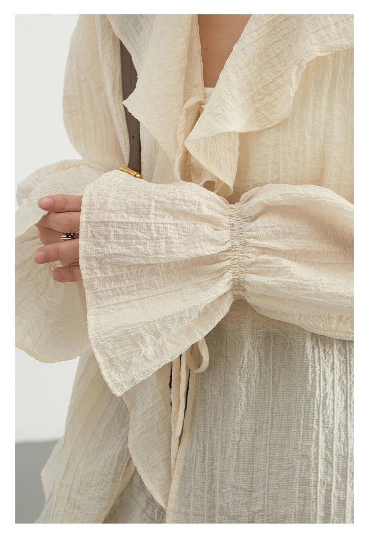 Ruffled V-Neck Lace-Up Blouse – Spring 2025 Collection