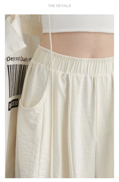 High-Waist White Pleated Pants – 2025 Collection