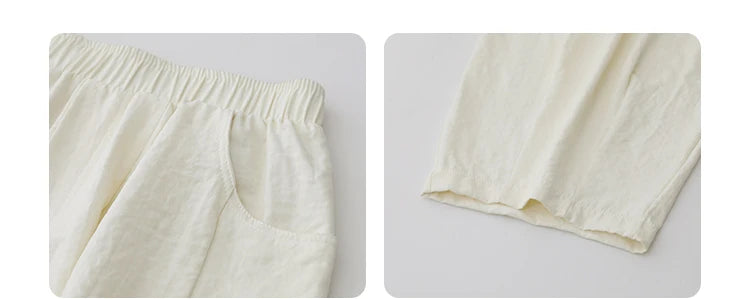 High-Waist White Pleated Pants – 2025 Collection