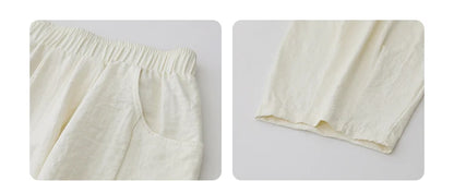 High-Waist White Pleated Pants – 2025 Collection